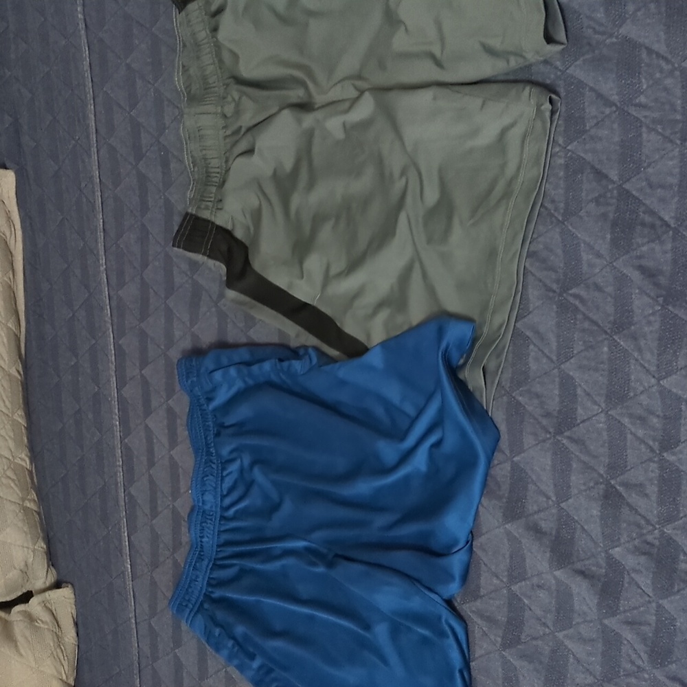 Two pairs of under armor medium shorts